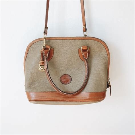 where are dooney and bourke purses made